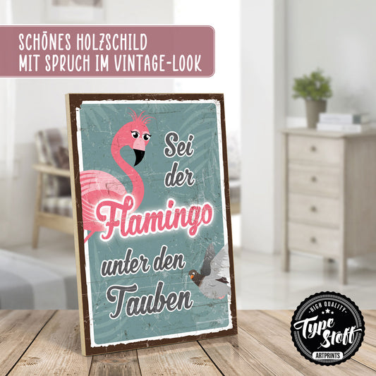 Holzschild mit Spruch - Sei der Flamingo unter den Tauben – HS-GH-00793